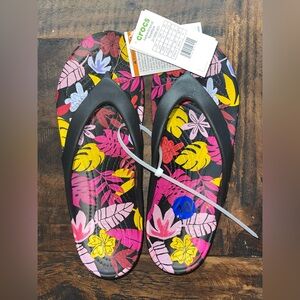 Crocs women’s size 10 Colorful Floral Flip Flops